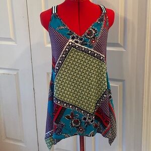 Candie’s asymmetrical top